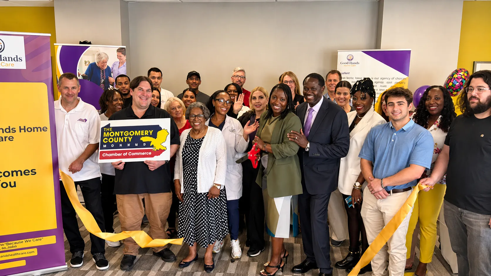 Good Hands team at a ribbon cutting