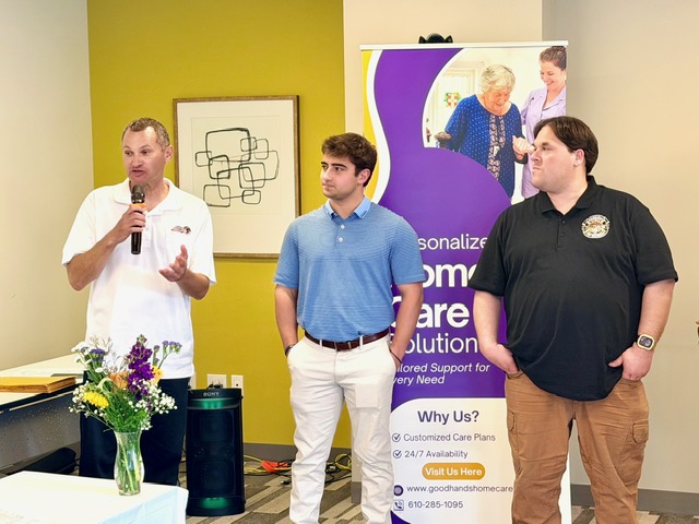 Good Hands Home Care team with a guest speaker