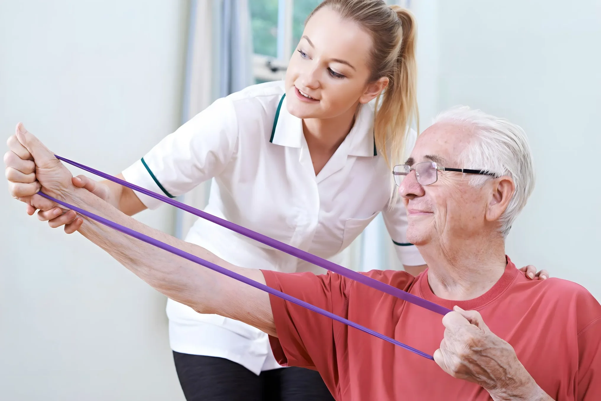 caregiver assisting senior with daily exercise