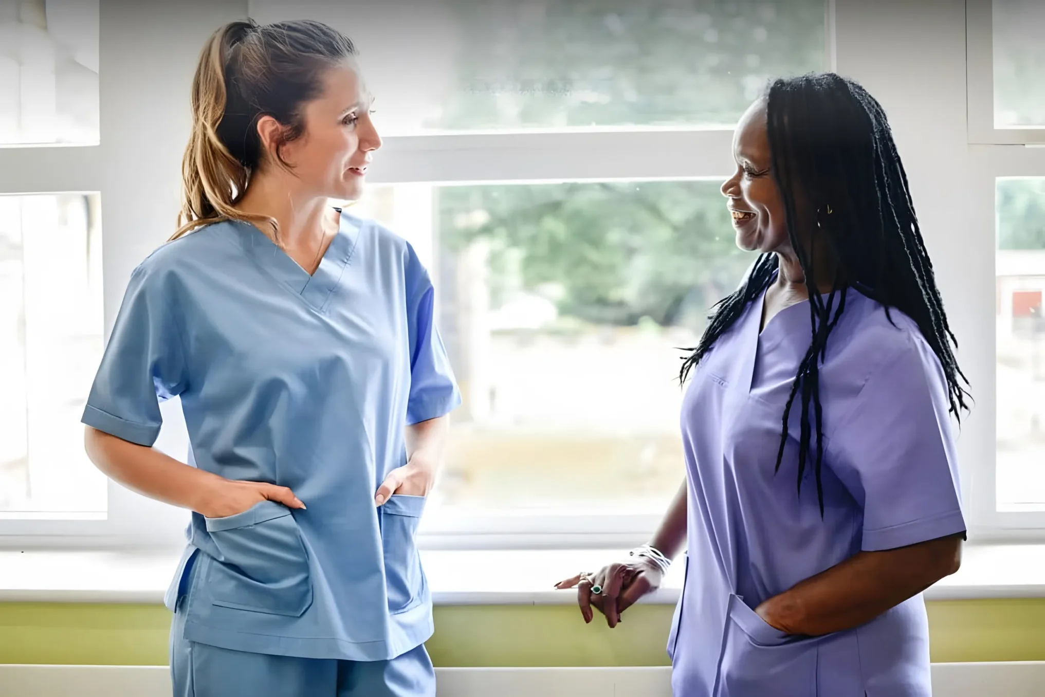Two home health care professionals